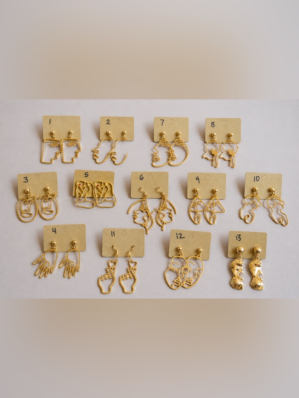 Pick any 3! 3 for $10 Gold plated surrealist art earrings